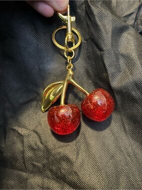 Sparkling Red Cherry Keychain with Gold Accents